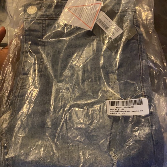 SKINNY STRETCH EXPLODED KNEE POPPER HEM JEANS - Picture 3 of 4